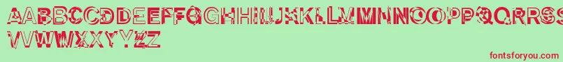 DekunstInitialen Font – Red Fonts on Green Background