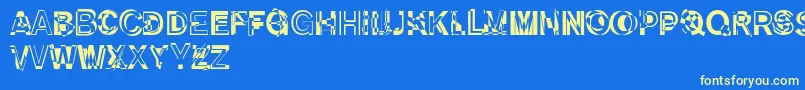 DekunstInitialen Font – Yellow Fonts on Blue Background