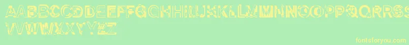 DekunstInitialen Font – Yellow Fonts on Green Background