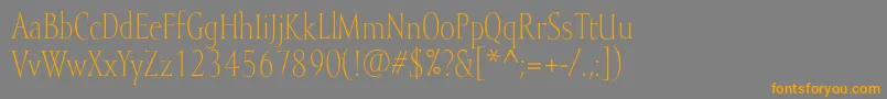 フォントMramorlight – オレンジの文字は灰色の背景にあります。