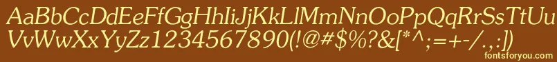 AgpresquirecItalic-fontti – keltaiset fontit ruskealla taustalla