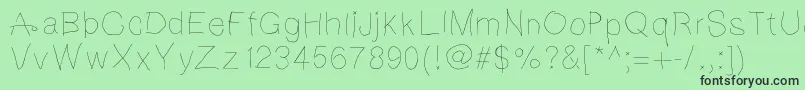 Notebookscribble Font – Black Fonts on Green Background