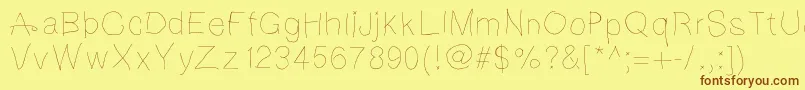 Notebookscribble Font – Brown Fonts on Yellow Background