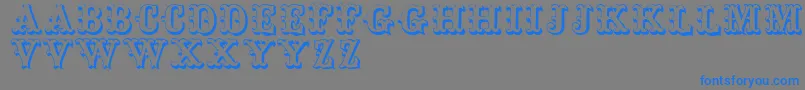 Toskanischeegyptienneinitialen-Schriftart – Blaue Schriften auf grauem Hintergrund