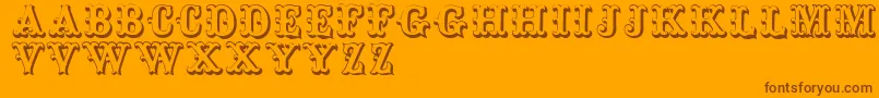 Toskanischeegyptienneinitialen-Schriftart – Braune Schriften auf orangefarbenem Hintergrund