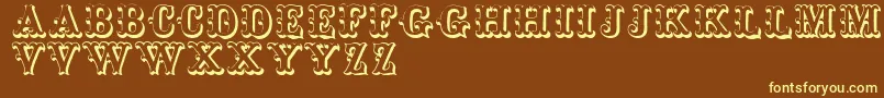 Toskanischeegyptienneinitialen Font – Yellow Fonts on Brown Background