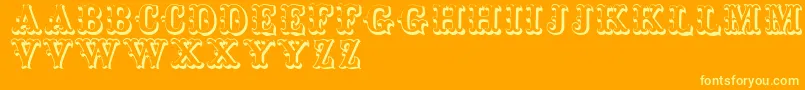 Toskanischeegyptienneinitialen-Schriftart – Gelbe Schriften auf orangefarbenem Hintergrund