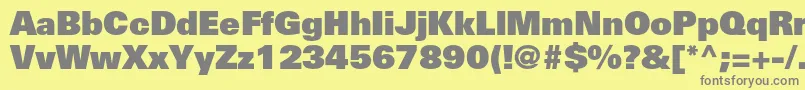UniversltstdXblack Font – Gray Fonts on Yellow Background
