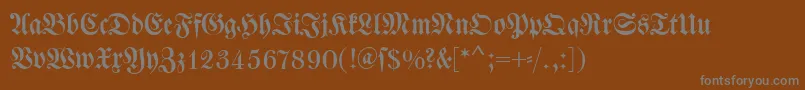 Dswalbaumfraktur Font – Gray Fonts on Brown Background