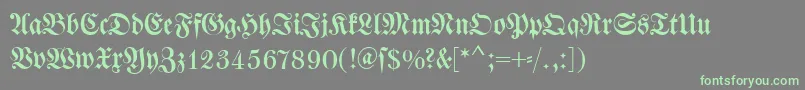 Dswalbaumfraktur-Schriftart – Grüne Schriften auf grauem Hintergrund