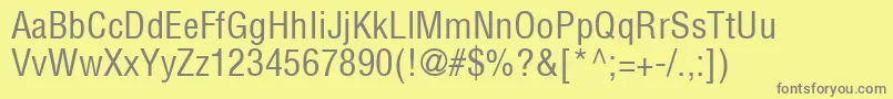 HelveticaLtCondensedMedium-fontti – harmaat kirjasimet keltaisella taustalla