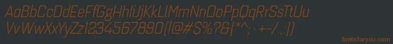 Czcionka Quarcanormbookitalic – brązowe czcionki na czarnym tle