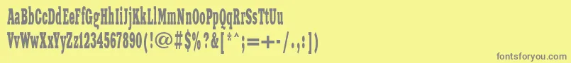 Xeniawesternctt-fontti – harmaat kirjasimet keltaisella taustalla