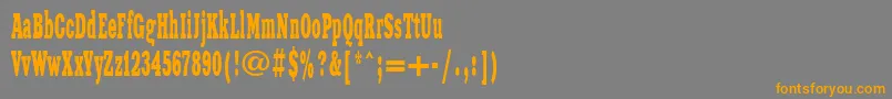 フォントXeniawesternctt – オレンジの文字は灰色の背景にあります。