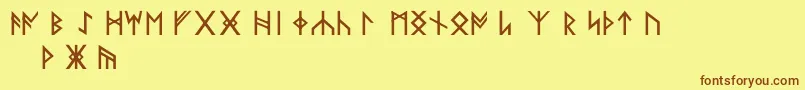 フォントNorskode – 茶色の文字が黄色の背景にあります。