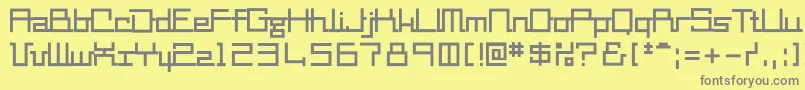 Mm2-fontti – harmaat kirjasimet keltaisella taustalla