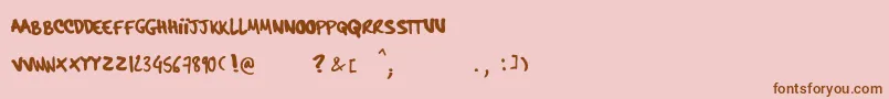 Шрифт HardcorePenRegular – коричневые шрифты на розовом фоне