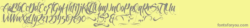 Fonte Feathergraphy2 – fontes cinzas em um fundo amarelo