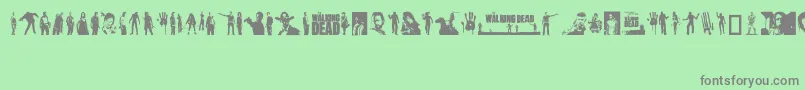 TheWalkingDead-Schriftart – Graue Schriften auf grünem Hintergrund