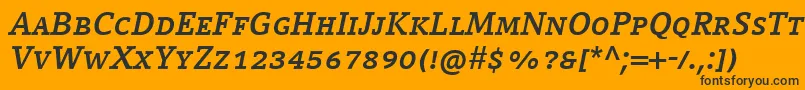 Шрифт CompatilLetterLtComBoldItalicSmallCaps – чёрные шрифты на оранжевом фоне