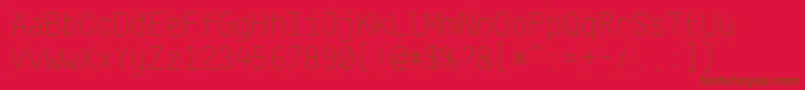 KlartextMonoThin-Schriftart – Braune Schriften auf rotem Hintergrund