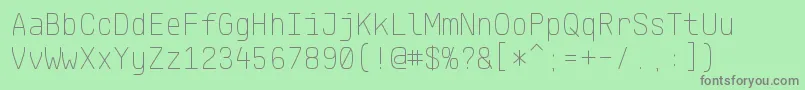 フォントKlartextMonoThin – 緑の背景に灰色の文字