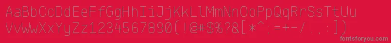 フォントKlartextMonoThin – 赤い背景に灰色の文字