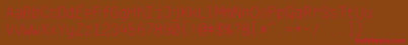 フォントKlartextMonoThin – 赤い文字が茶色の背景にあります。