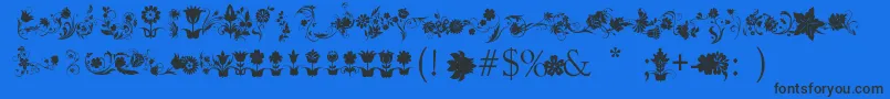 FotograamiFlower-Schriftart – Schwarze Schriften auf blauem Hintergrund