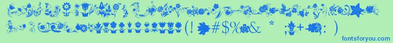 Шрифт FotograamiFlower – синие шрифты на зелёном фоне