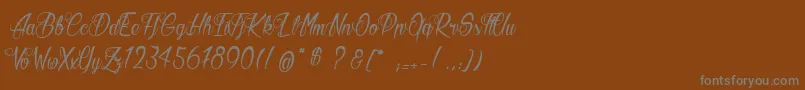 ButterKings Font – Gray Fonts on Brown Background