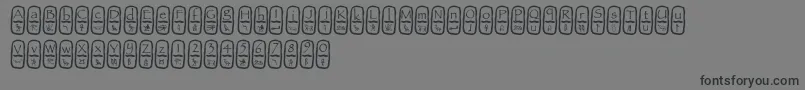 Cartouche-fontti – mustat fontit harmaalla taustalla