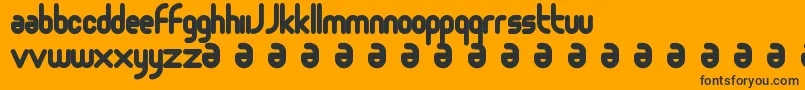 Czcionka Moloko – czarne czcionki na pomarańczowym tle