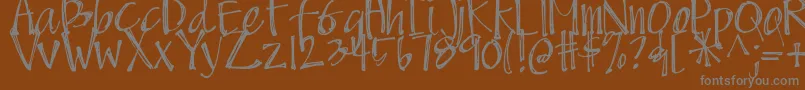 DjbScruffyAngel Font – Gray Fonts on Brown Background