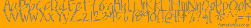 DjbScruffyAngel-Schriftart – Graue Schriften auf orangefarbenem Hintergrund