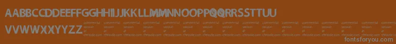 NecromongerRegular Font – Gray Fonts on Brown Background