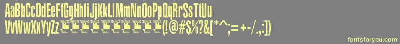 YacarenaUltraPersonalUse-fontti – keltaiset fontit harmaalla taustalla