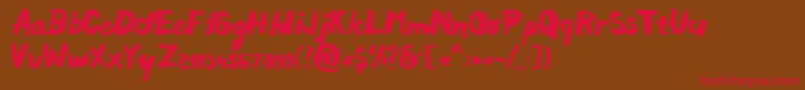 フォントChocoleta – 赤い文字が茶色の背景にあります。