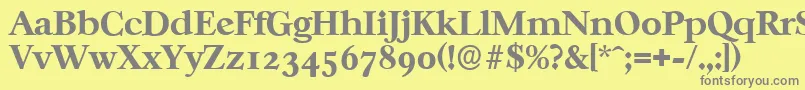 CasablancaserialXboldRegular-fontti – harmaat kirjasimet keltaisella taustalla