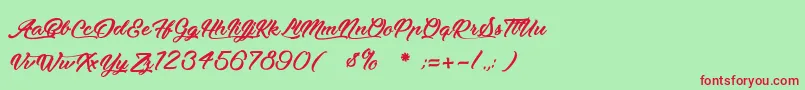 MoonlightsOnTheBeach Font – Red Fonts on Green Background
