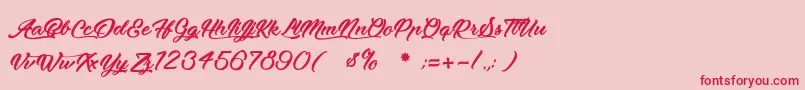 MoonlightsOnTheBeach Font – Red Fonts on Pink Background