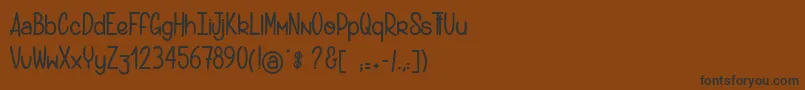 Więcej informacji o czcionce Gantsdesoie Czcionka Gantsdesoie – czarne czcionki na brązowym tle