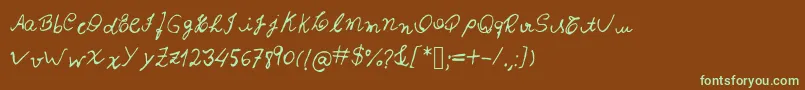 フォントIzabela – 緑色の文字が茶色の背景にあります。
