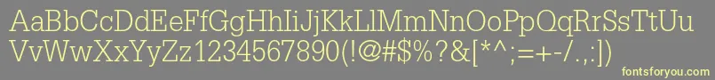 GlyphaltstdLight Font – Yellow Fonts on Gray Background