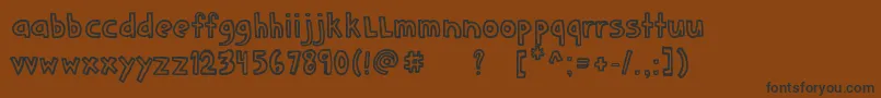 Fonte DenneSchoolgirl – fontes pretas em um fundo marrom