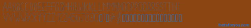 Pwdottedfont Font – Blue Fonts on Brown Background