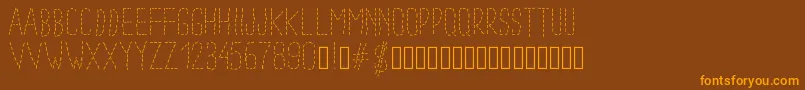 Pwdottedfont Font – Orange Fonts on Brown Background