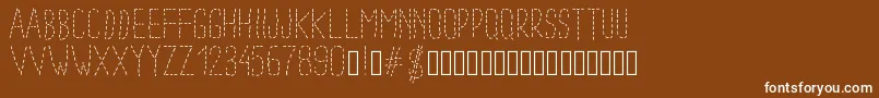 Шрифт Pwdottedfont – белые шрифты на коричневом фоне