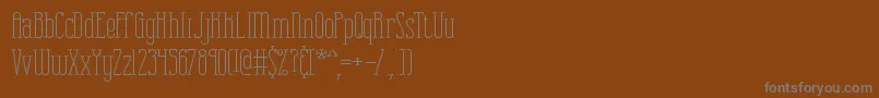 Combuspl Font – Gray Fonts on Brown Background