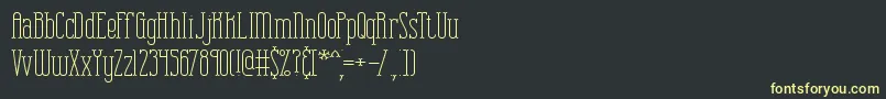 フォントCombuspl – 黒い背景に黄色の文字